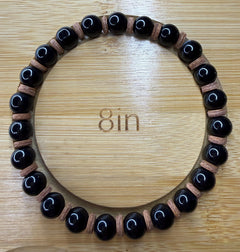 Black Bead Bracelet with Leather Spacer Accents